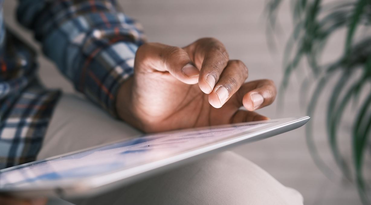 man with tablet